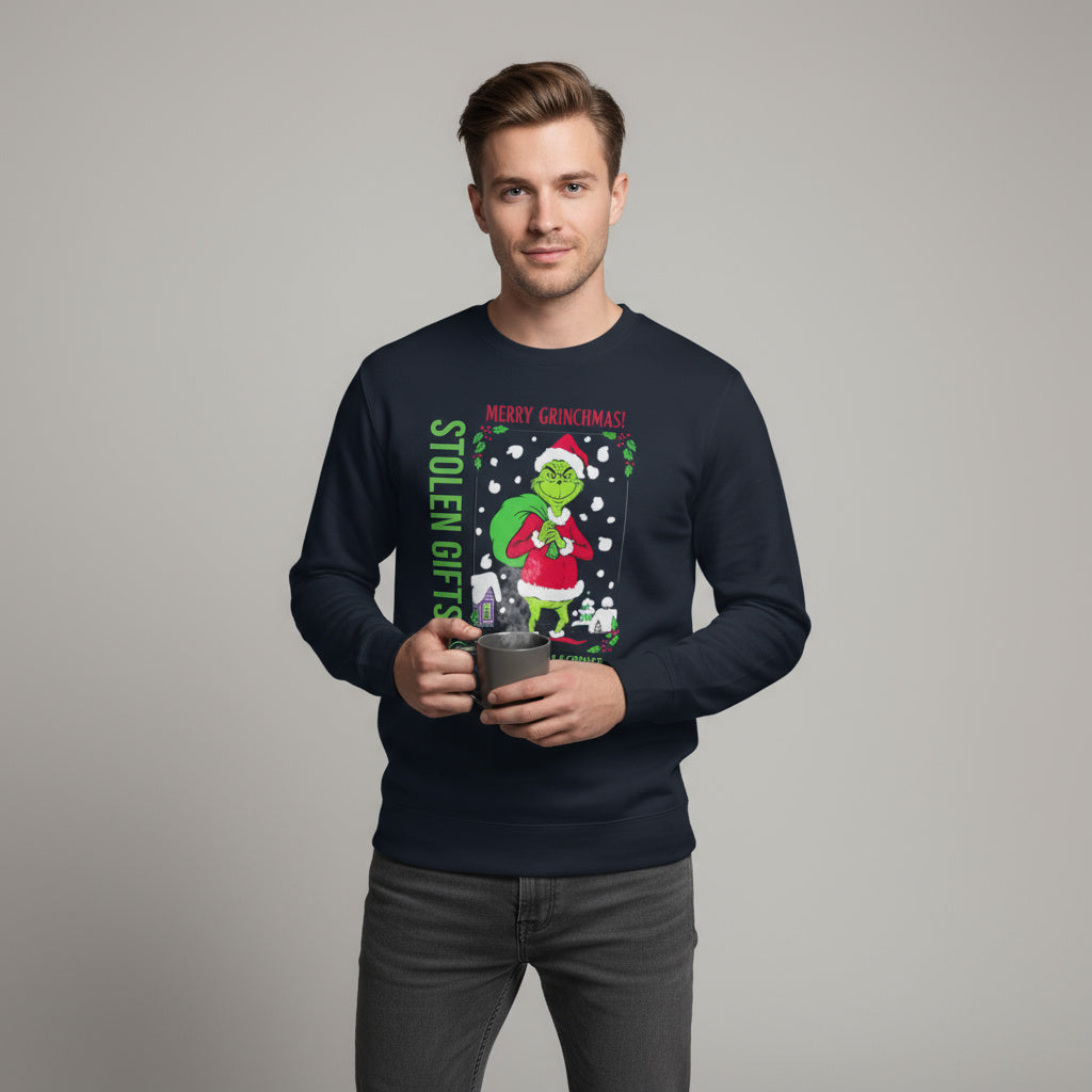 Man wearing a navy blue sweater with a Christmas design.