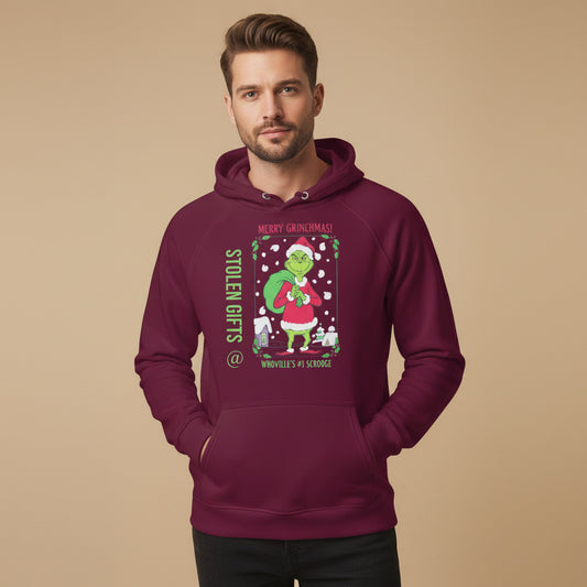 Man wearing a  burgundy hoodie with a Christmas-themed graphic 