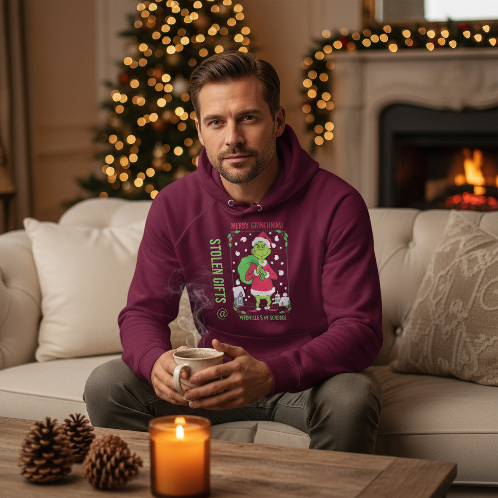Man wearing a burgundy hoodie with a Christmas design